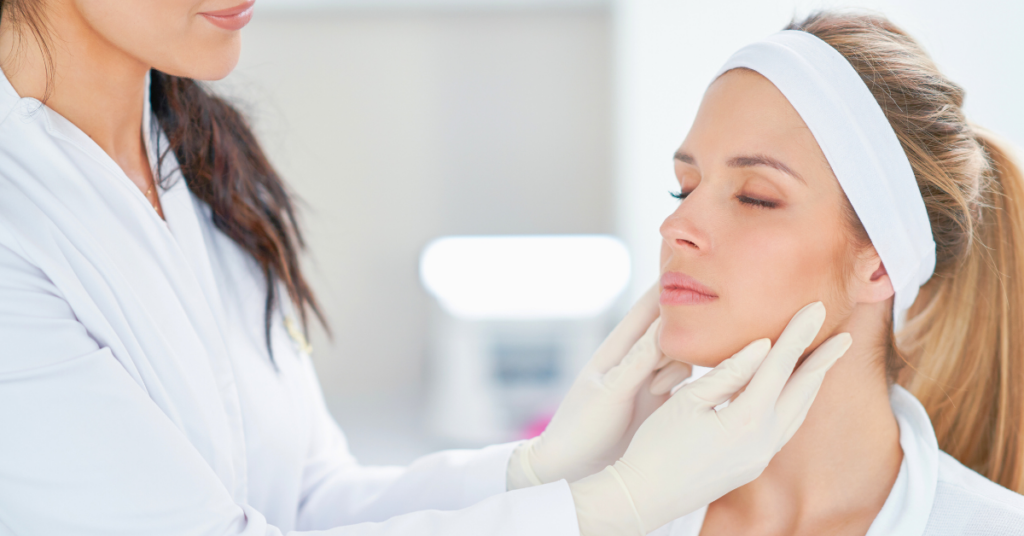 woman receiving a consultation from a professional at a medical aesthetic center